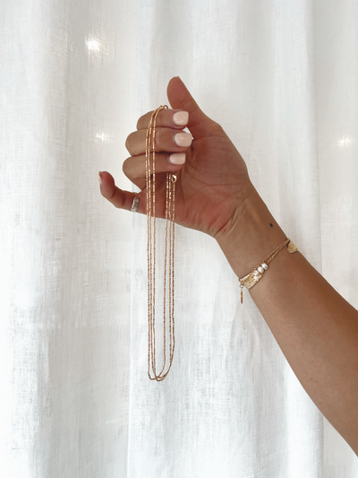 THE HENI CHAIN