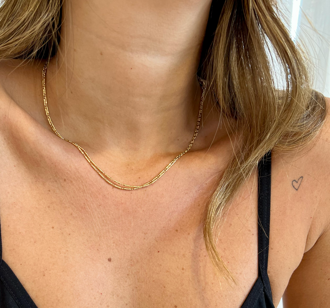 THE HENI CHAIN